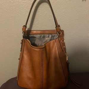 Medium sized brown hand bag